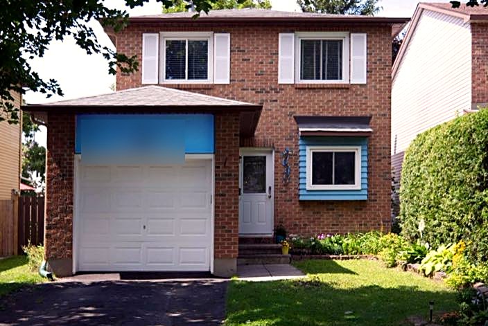 Front exterior of a sold detached two-storey with blue accents